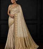 Off white woven design zari silk blend saree