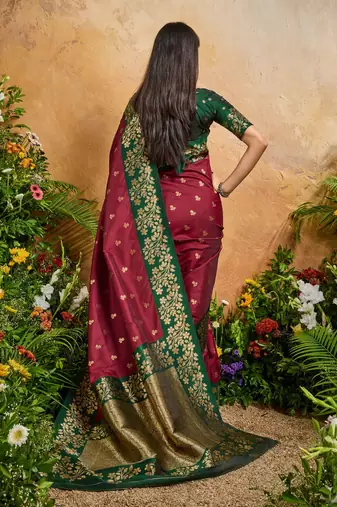 Maroon ethnic motifs woven design saree with unstitched blouse