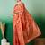 Orange zari woven kanjeevaram saree with blouse piece