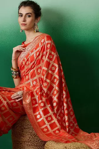 Orange zari woven kanjeevaram saree with blouse piece