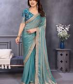 Blue embroidered lace border saree with matching blouse piece