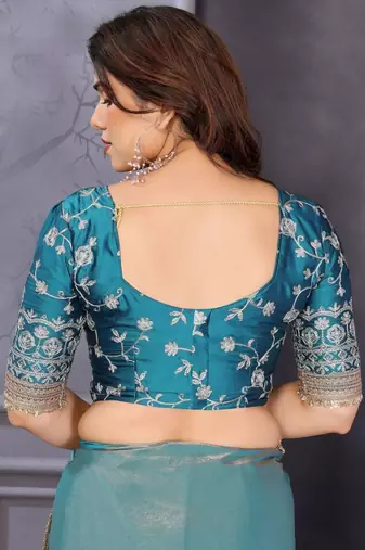 Blue embroidered lace border saree with matching blouse piece