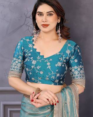 Blue embroidered lace border saree with matching blouse piece 5