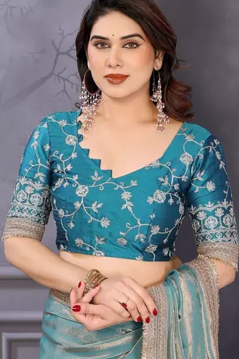Blue embroidered lace border saree with matching blouse piece