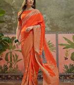 Orange ethnic motifs zari saree with blouse piece