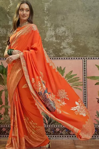 Orange ethnic motifs zari saree with blouse piece