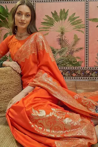 Orange ethnic motifs zari saree with blouse piece