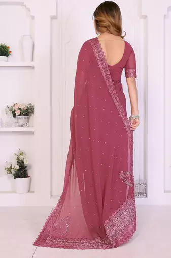 Pink embroidered lace work saree with matching blouse piece