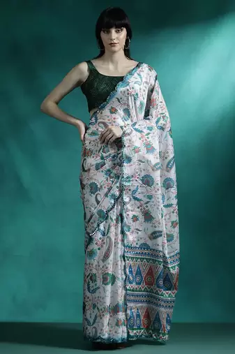 White ethnic motifs printed & mirror work saree with blouse