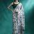 White ethnic motifs printed & mirror work saree with blouse