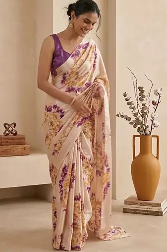 Cream women cream coloured purple floral printed pre draped saree