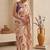 Cream women cream coloured purple floral printed pre draped saree