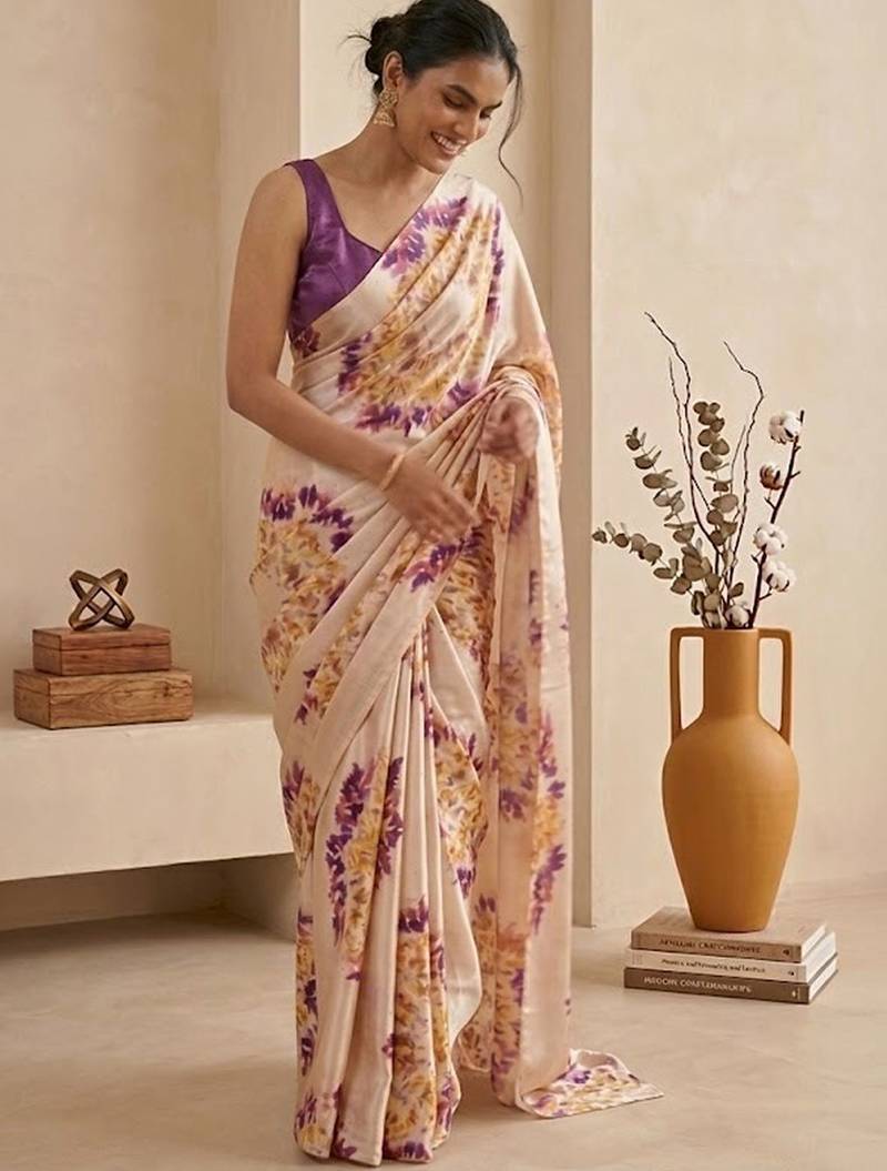 Cream women cream coloured purple floral printed pre draped saree