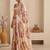 Cream women cream coloured purple floral printed pre draped saree