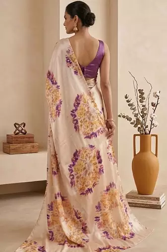 Cream women cream coloured purple floral printed pre draped saree