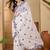 White embroidered chiffon saree