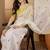 White embroidered chiffon saree
