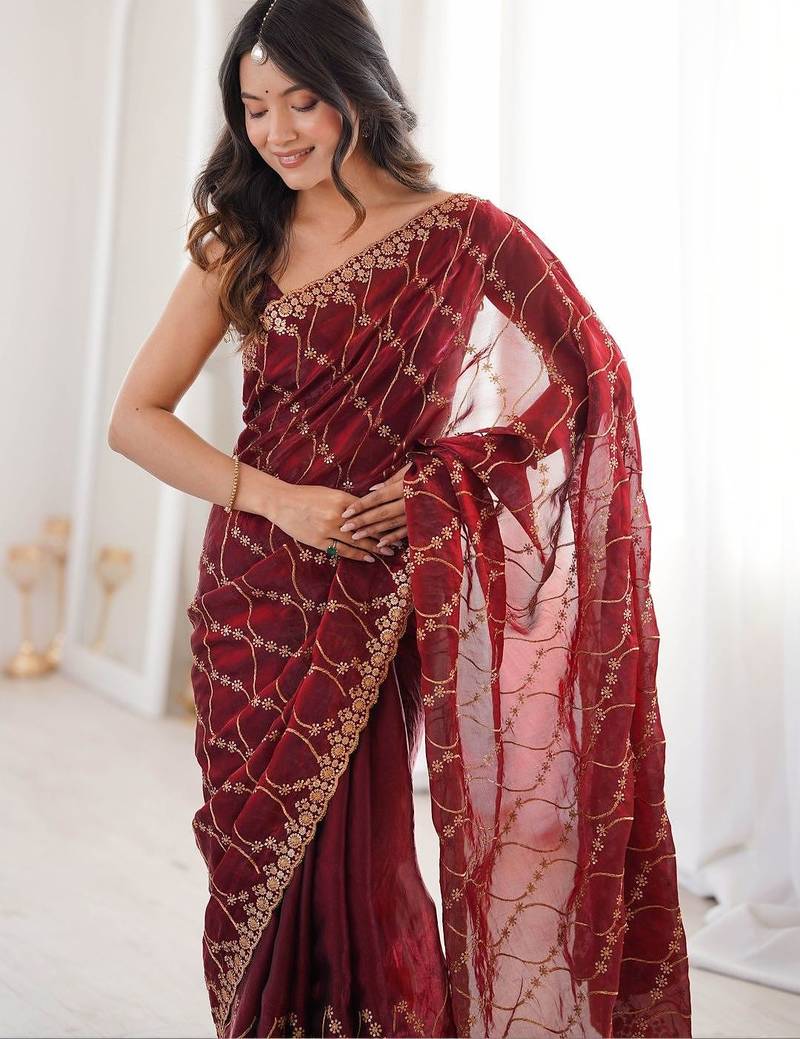 Maroon embellished zari tissue heavy work saree
