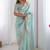 Green tissue silk sequence embroideried border blouse piece & sarees