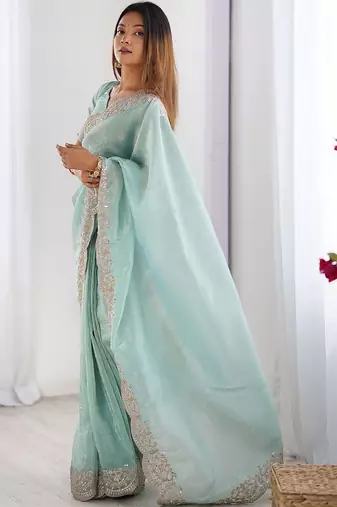 Green tissue silk sequence embroideried border blouse piece & sarees