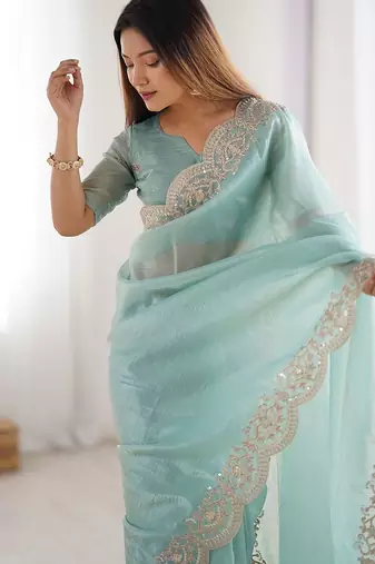 Green tissue silk sequence embroideried border blouse piece & sarees