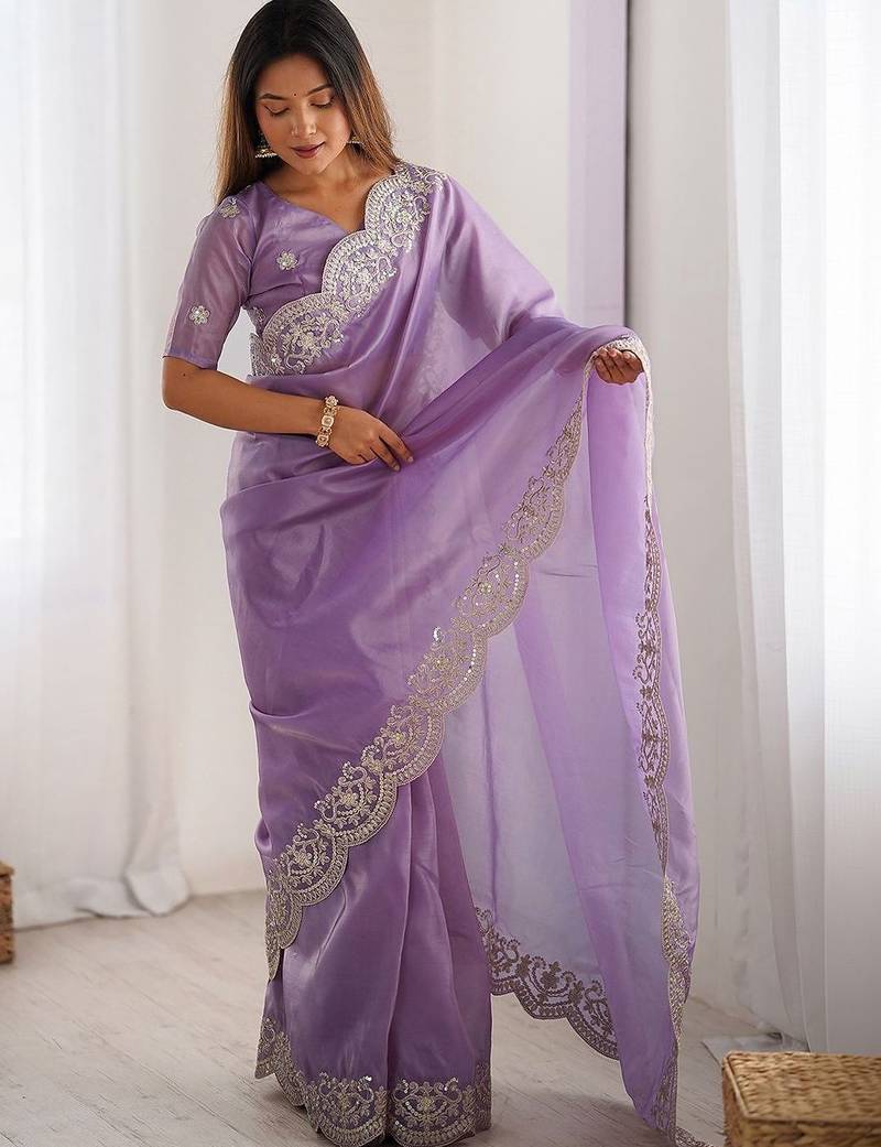 Purple tissue silk sequence embroideried border blouse piece & sarees