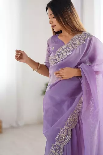 Purple tissue silk sequence embroideried border blouse piece & sarees