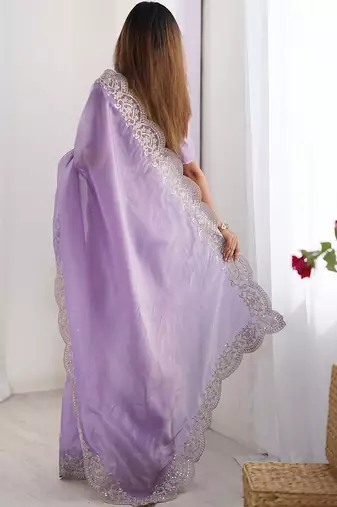 Purple tissue silk sequence embroideried border blouse piece & sarees