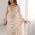 Cream embellished zari tissue designer saree