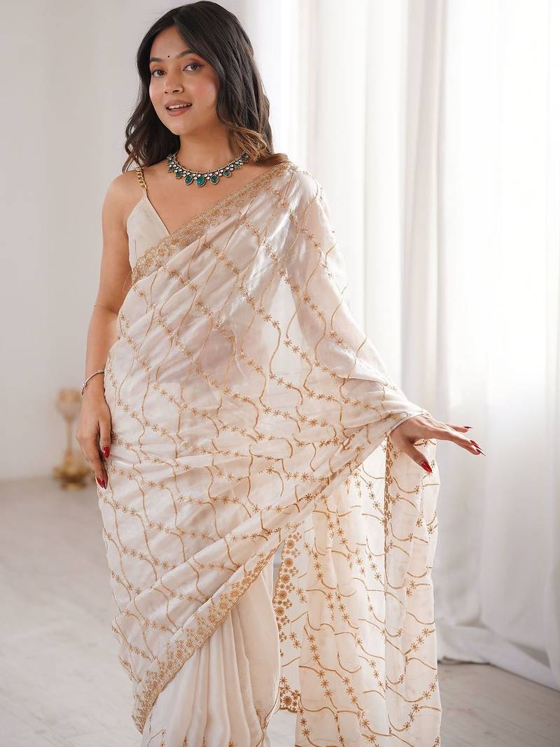 Cream embellished zari tissue designer saree