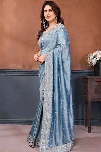 Blue sequence embroidered saree with matching blouse piece