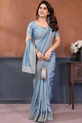 Blue sequence embroidered saree with matching blouse piece