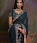 Teal georgette sequinned embellished saree