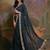 Teal georgette sequinned embellished saree