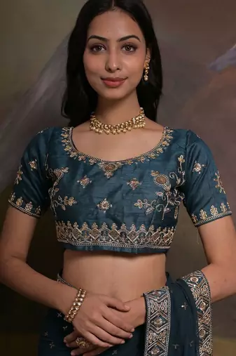 Teal georgette sequinned embellished saree