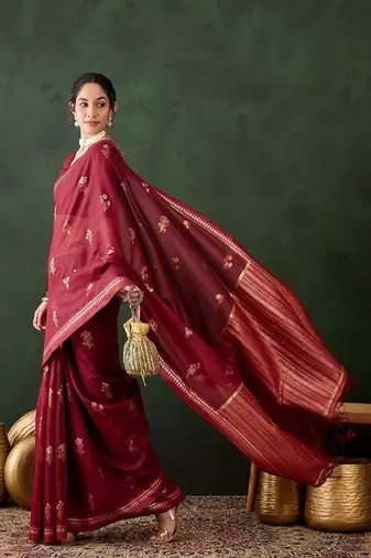 Red woven design kanjeevaram saree with blouse piece
