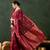 Red woven design kanjeevaram saree with blouse piece