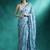Turquoise printed & embroidered saree with blouse