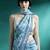 Turquoise printed & embroidered saree with blouse