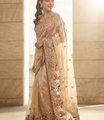 Beige embellished embroidered sequinned sarees with unstitched blouse piece