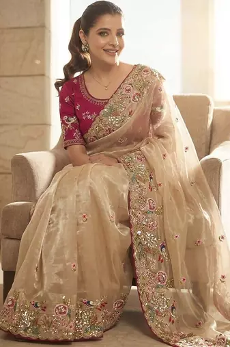 Beige embellished embroidered sequinned sarees with unstitched blouse piece