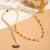 Gold plated kundan brown stones choker necklace