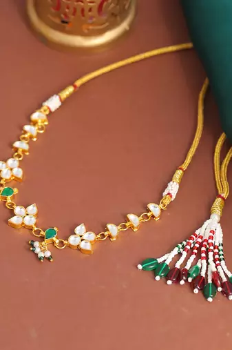 Gold plated kundan green and white stone choker necklace