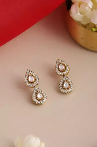 Gold plated kundan white stone stud earrings