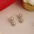 Gold plated kundan white stone stud earrings