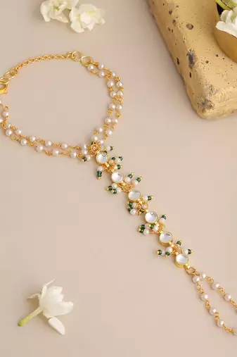 Gold plated kundan white and green haathphool