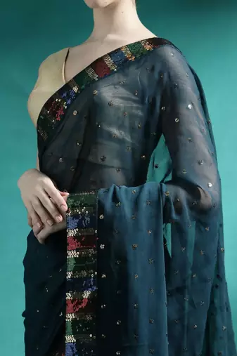 Teal sequence embroidered saree with unstitched blouse piece