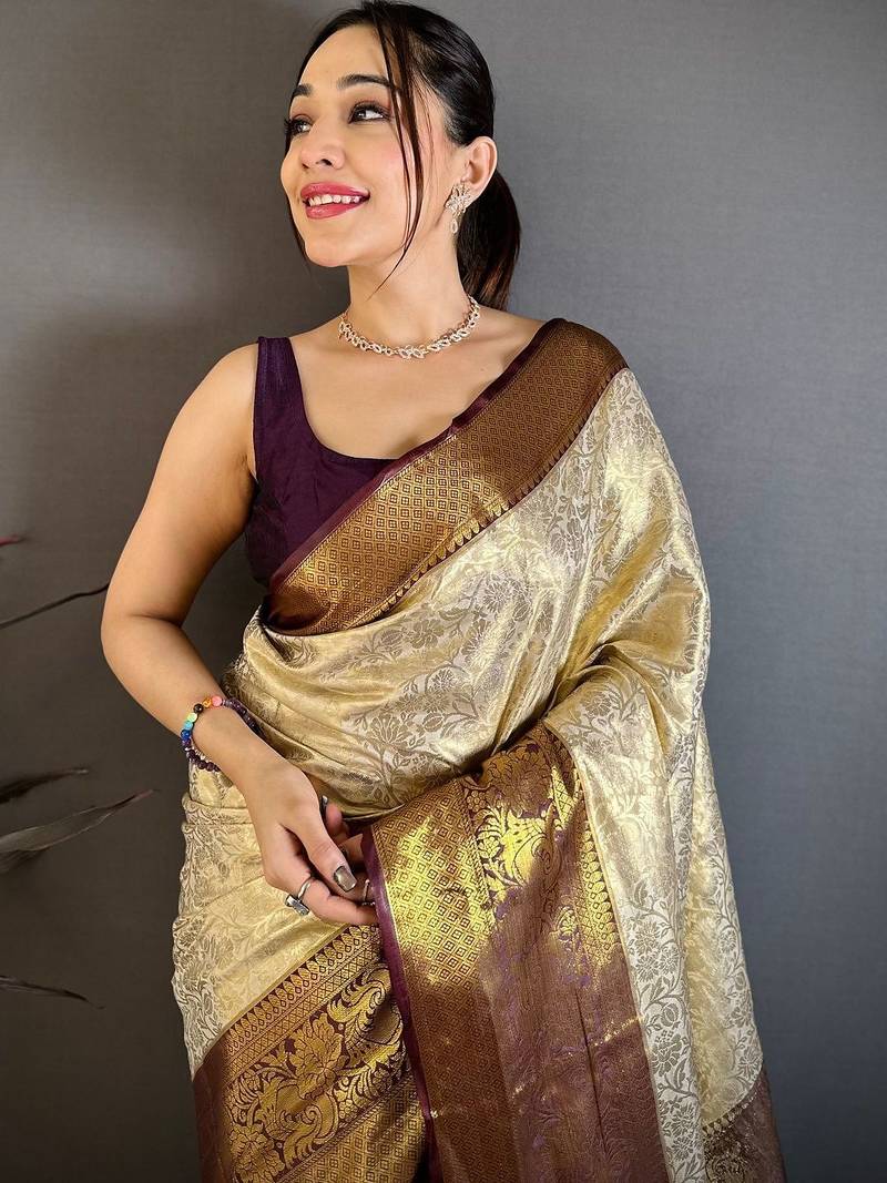 Cream floral woven design zari kanjeevaram saree with unstitched blouse piece