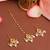 Gold plated kundan white beaded maang tikka with earrings