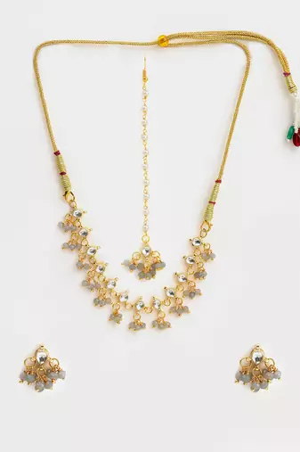 Gold plated kundan grey beaded necklace set with maang tikka and haathphool